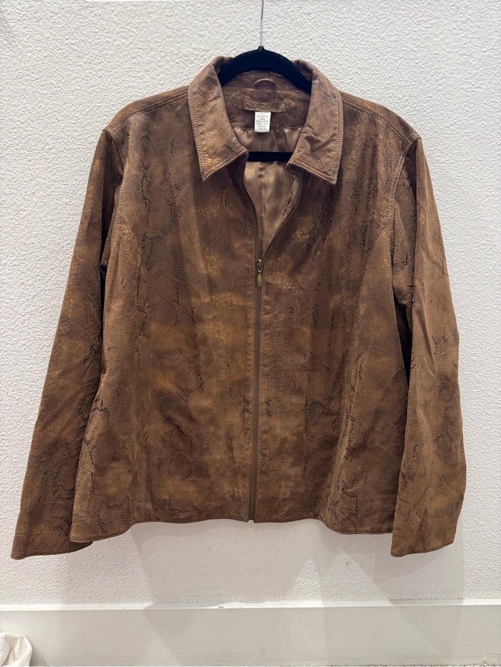 Chico's brand brown suede leather jacket with a unique snake print design.